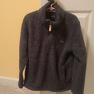 Kids Paragonia pull over in good shape.  It is a kids medium size 10.